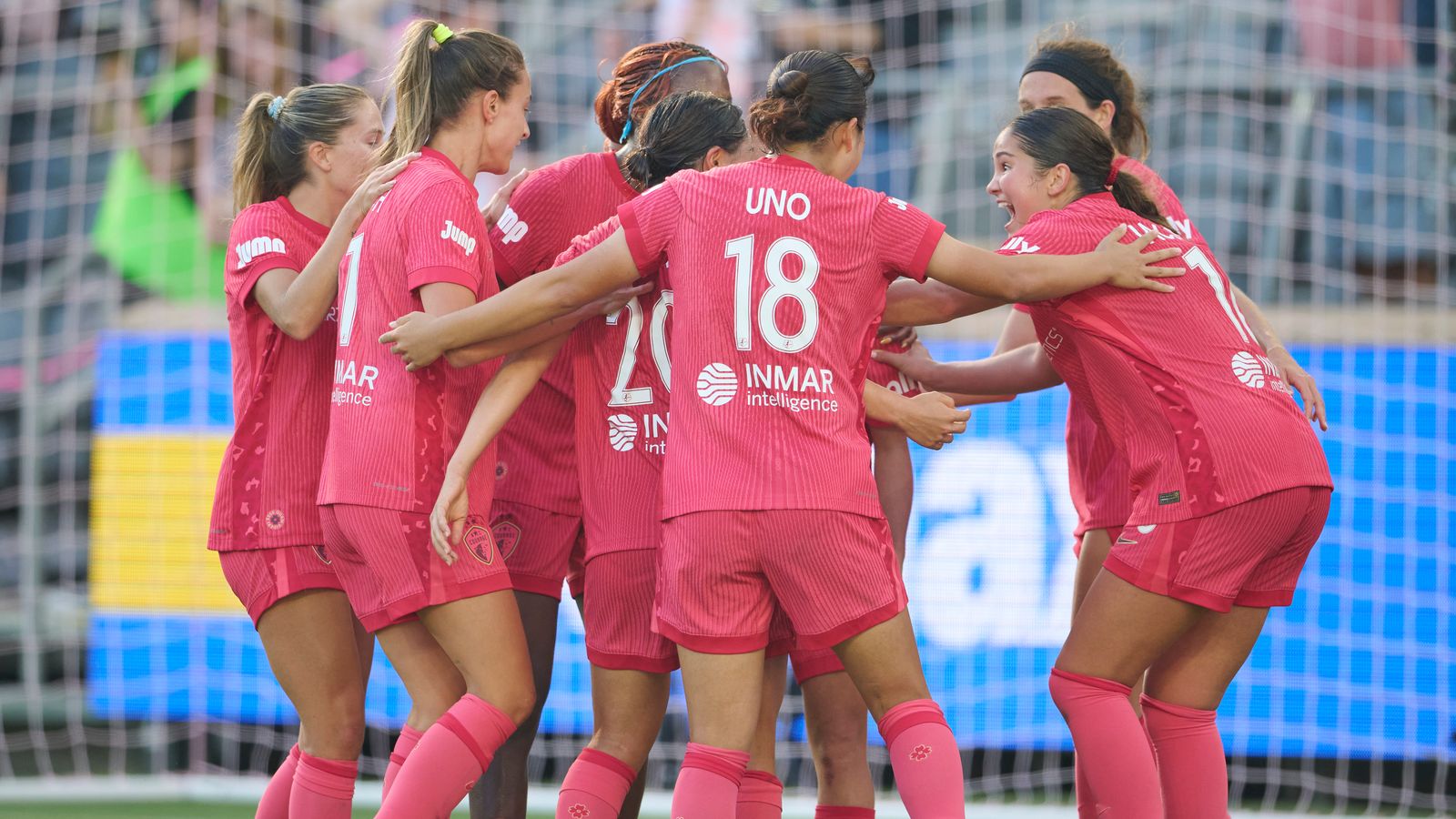 NC Courage players celebrate a goal against Angel City FC