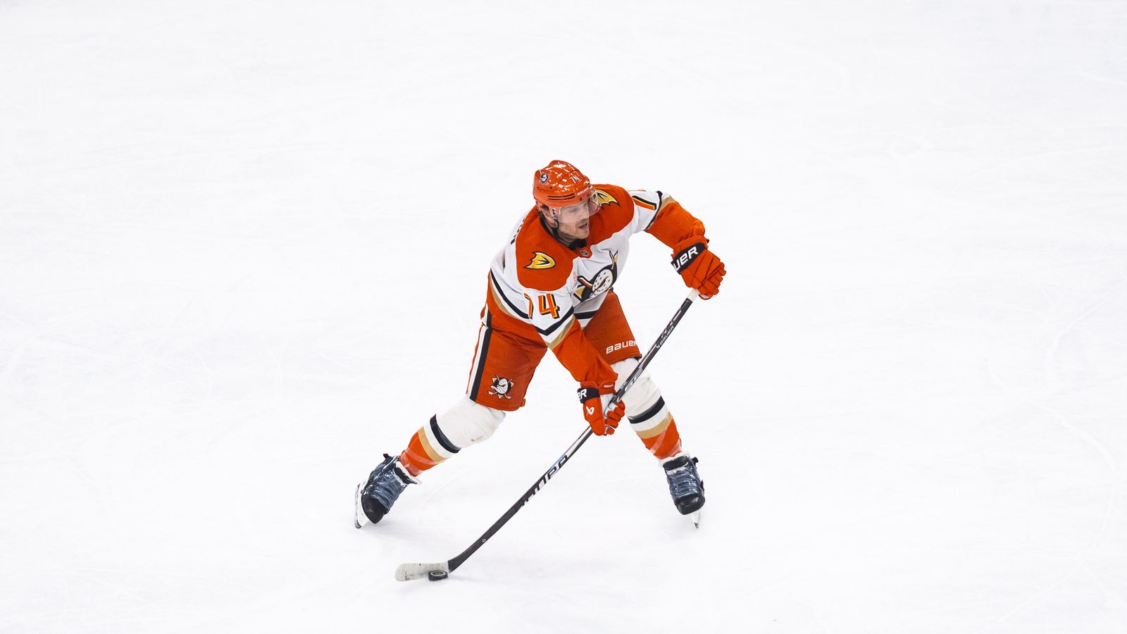 John Carlson prepares to pass in NHL playoff action against Golden Knights