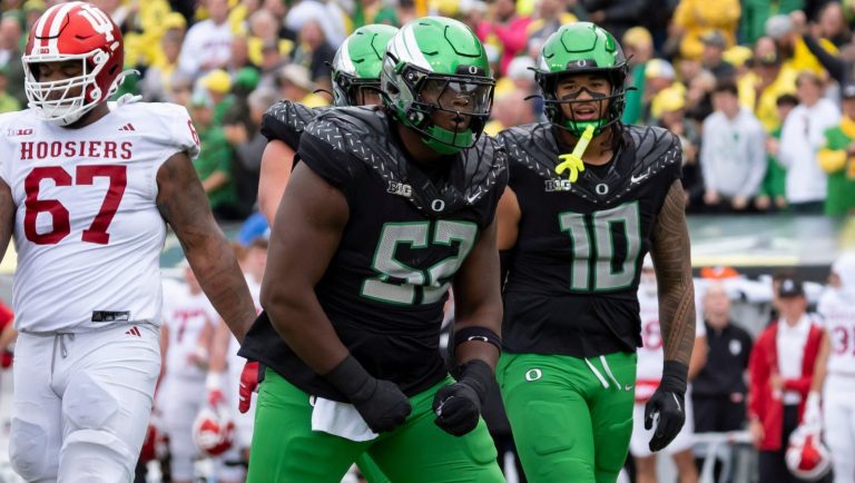 22) Denver Broncos: DL A'Mauri Washington, Oregon