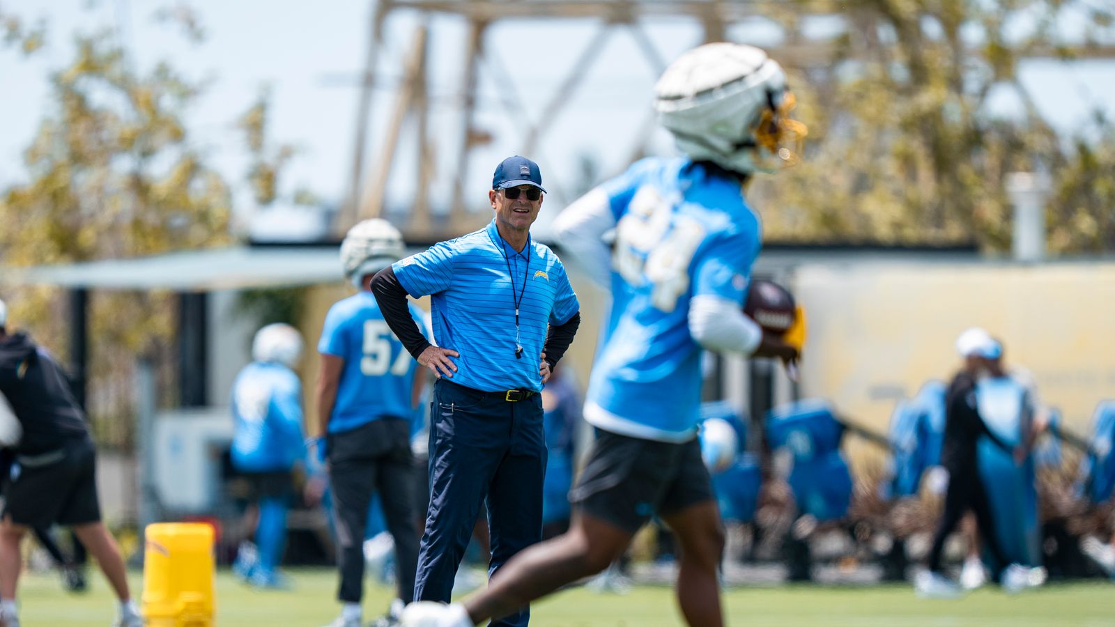 Jim Harbaugh oversees interception drills at Chargers OTA