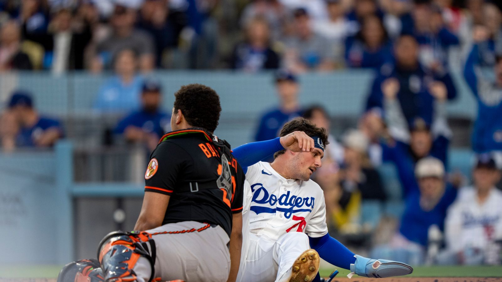 Alex Freeland slides home safely in Dodgers game