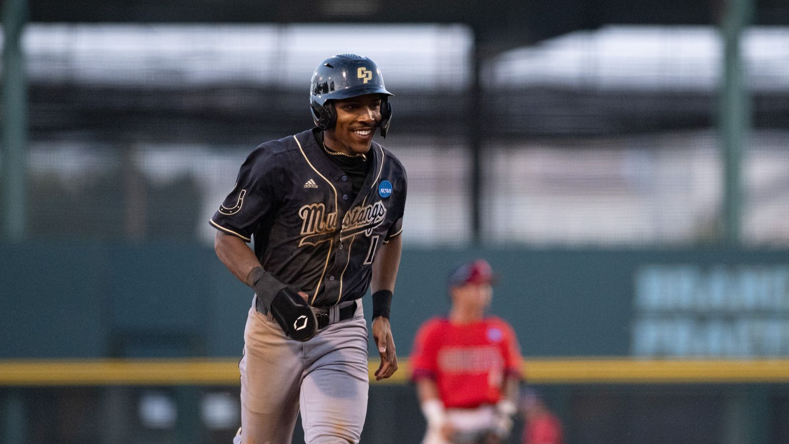 Casey Murray Jr smiles after a homerun
