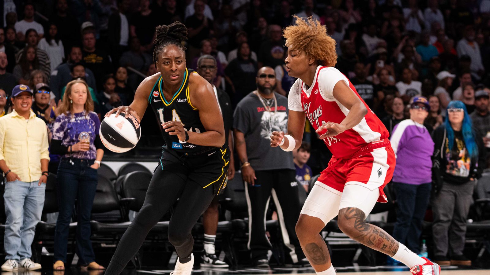 Nneka Ogwumike (30) attempts to score against the Aces in Los Angeles.