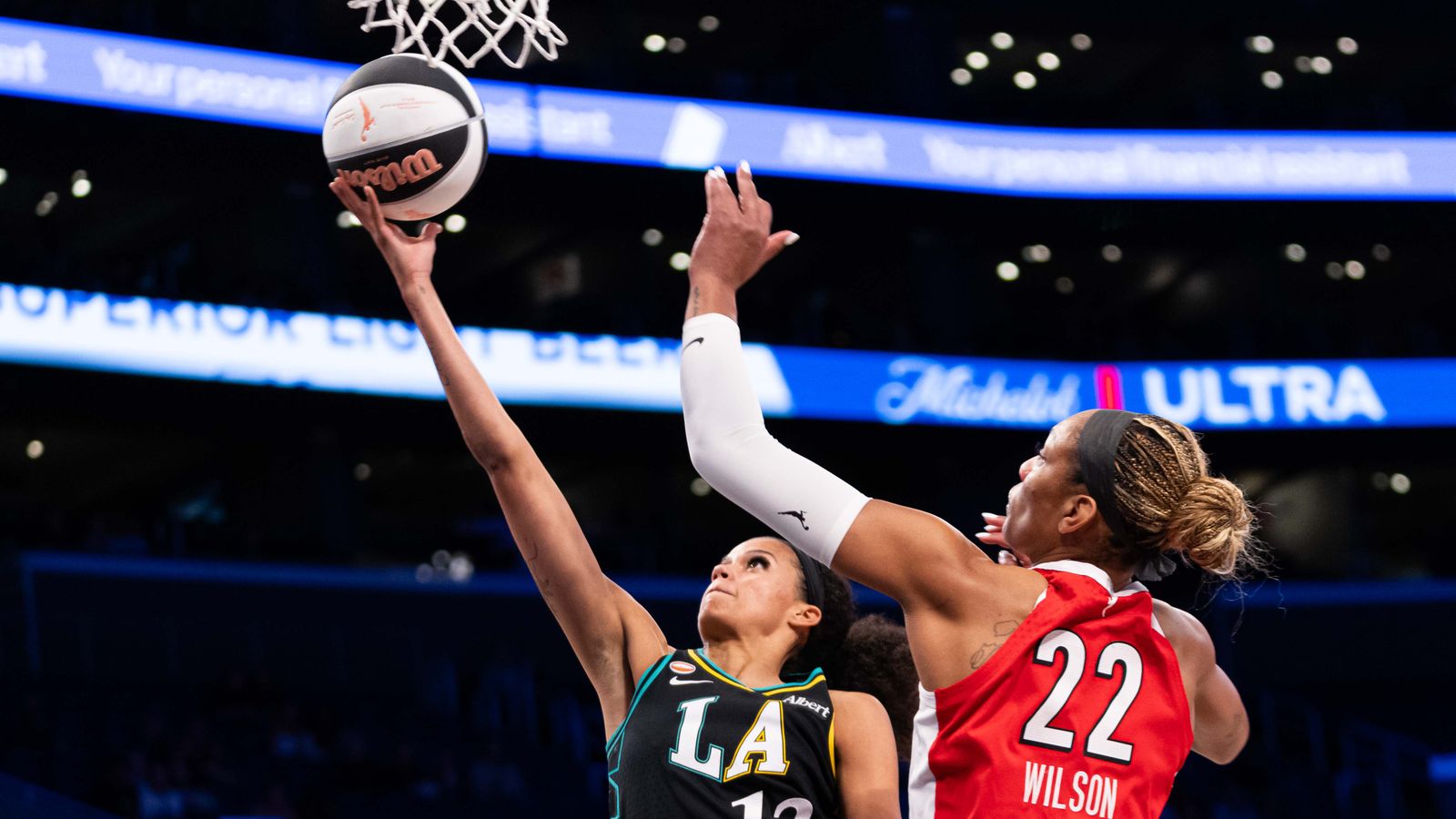 Rae Burrel (12) executes a lay-up against the Aces in Los Angeles.