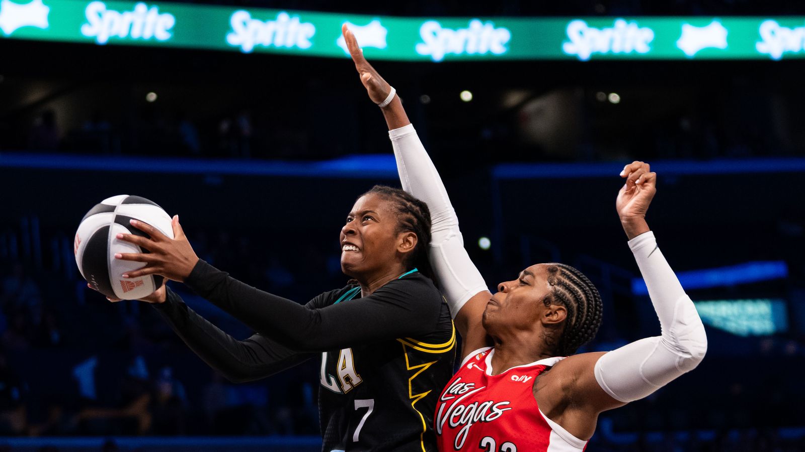 Ariel Atkins (7) takes a lay-up against the Aces in Los Angeles.