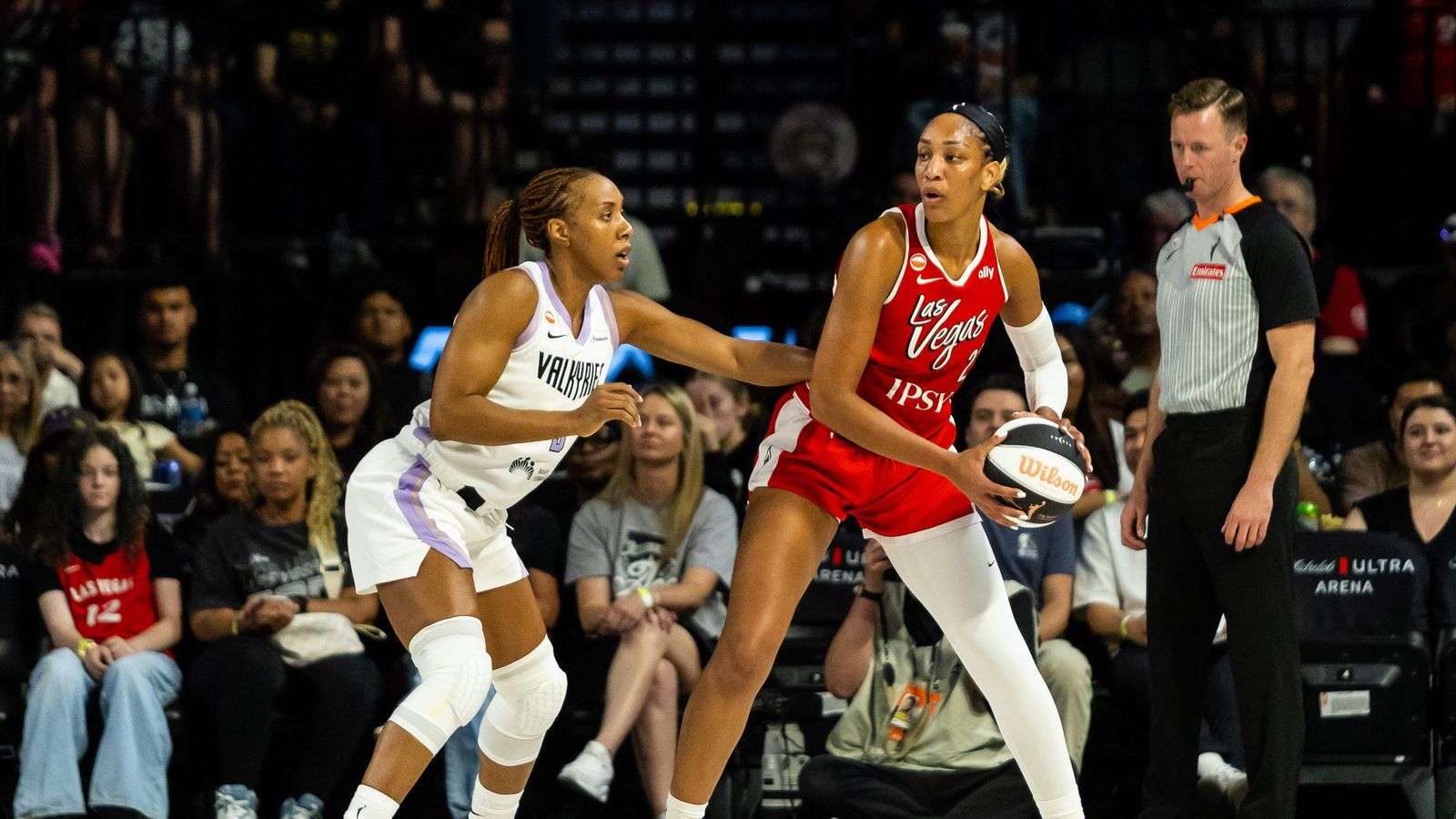 A'ja Wilson backs into Kayla Thorton in the post