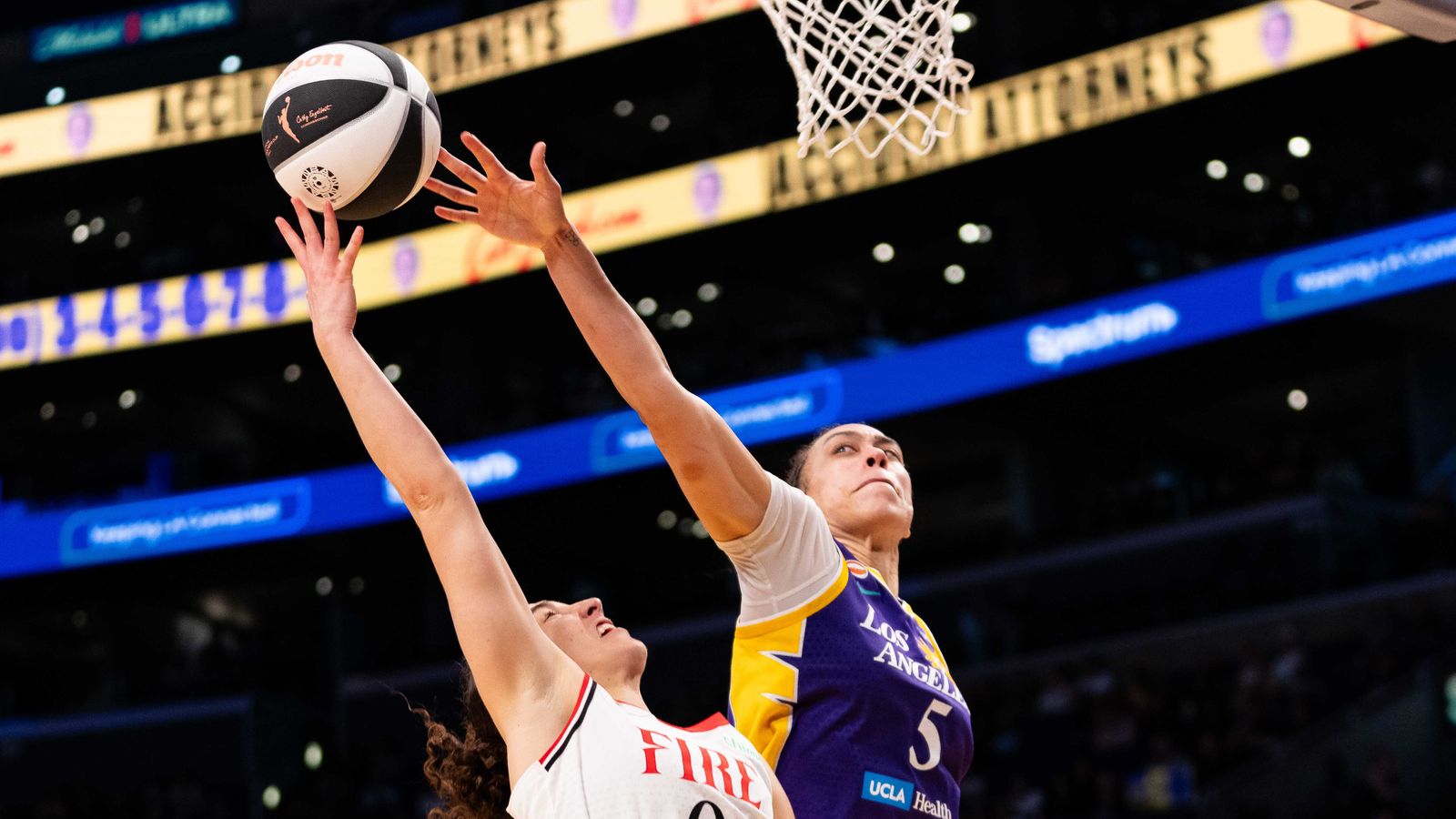 Dearica Hamby attempts a block in the game against Portland Fire.