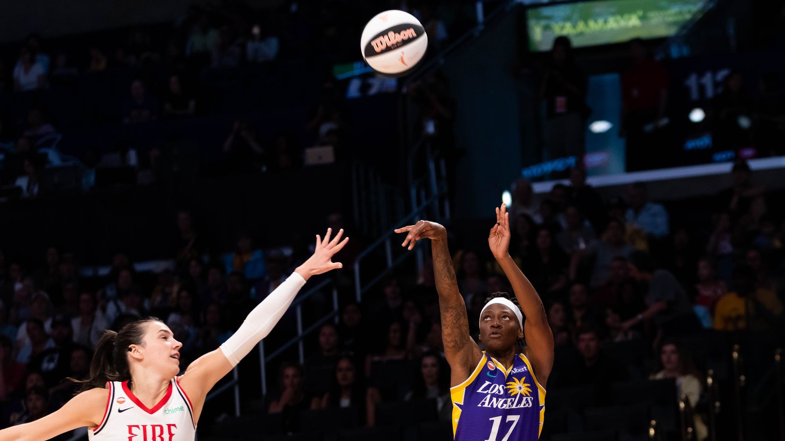 Erica Wheeler shoots a three-pointer against Portland Fire.