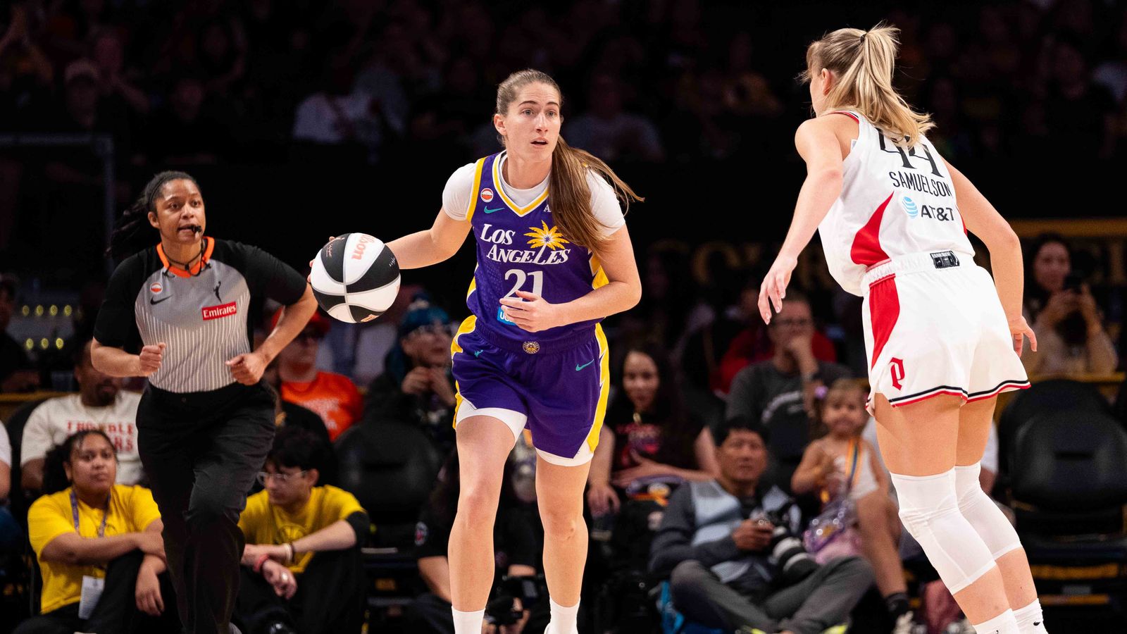 Kate Martin sets up the offense in WNBA game against Portland Fire.
