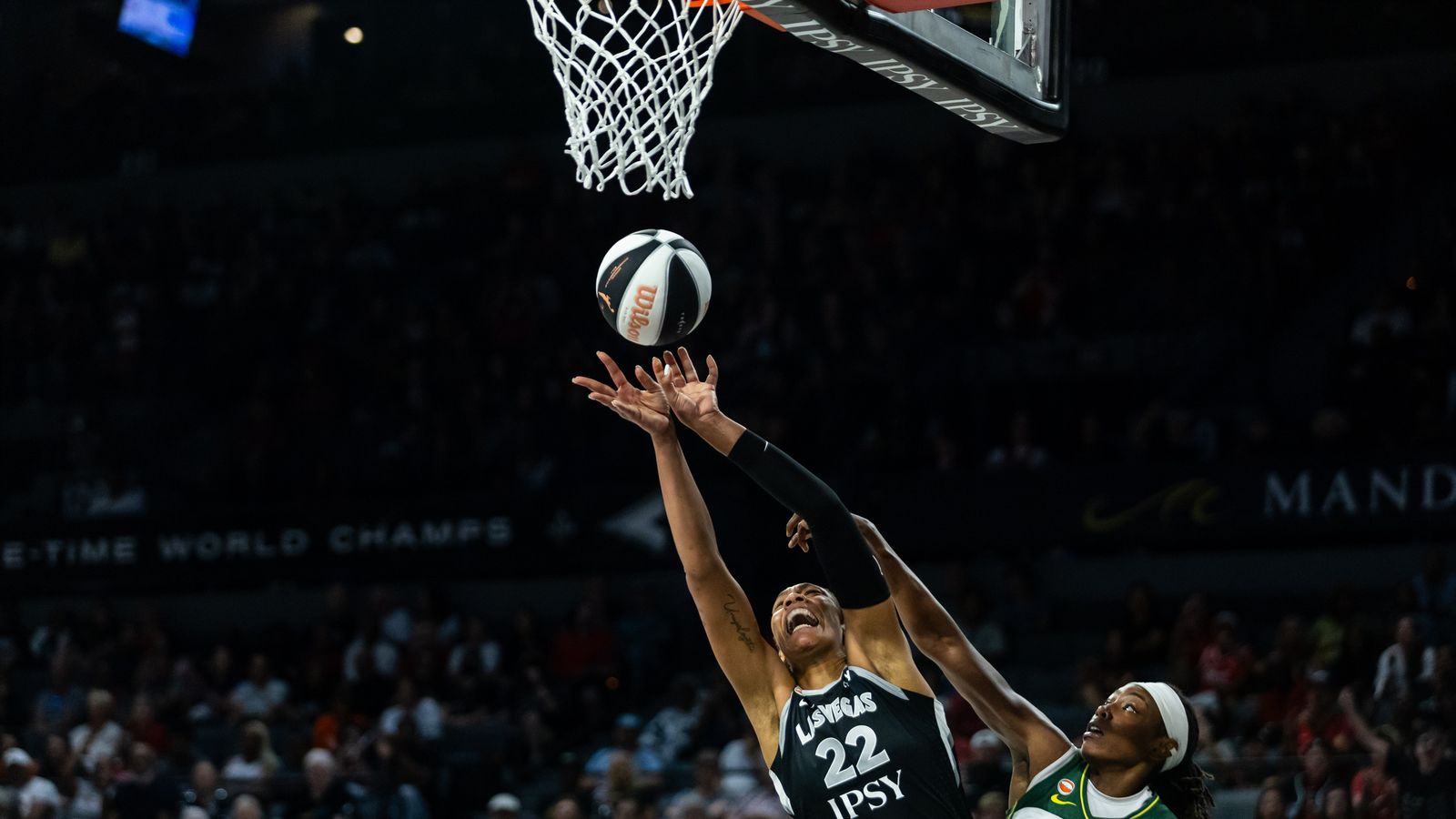Wilson and Horston battle for a rebound, Las Vegas vs. Seattle