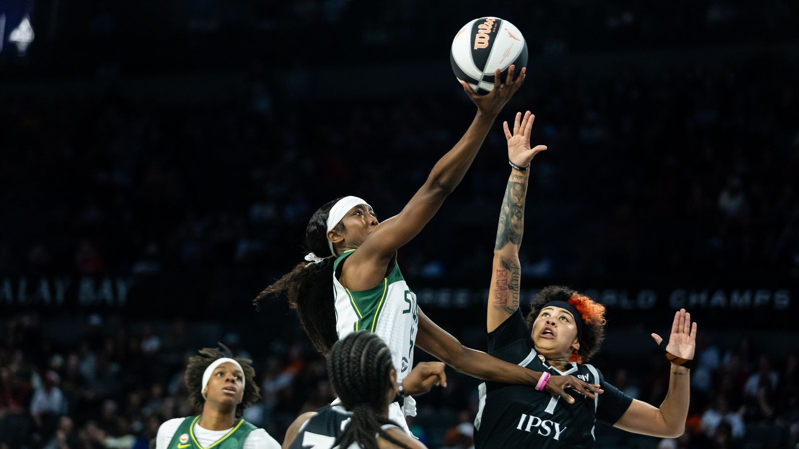 Flau'jae Johnson goes for lay-up in WNBA game, Las Vegas vs. Seattle