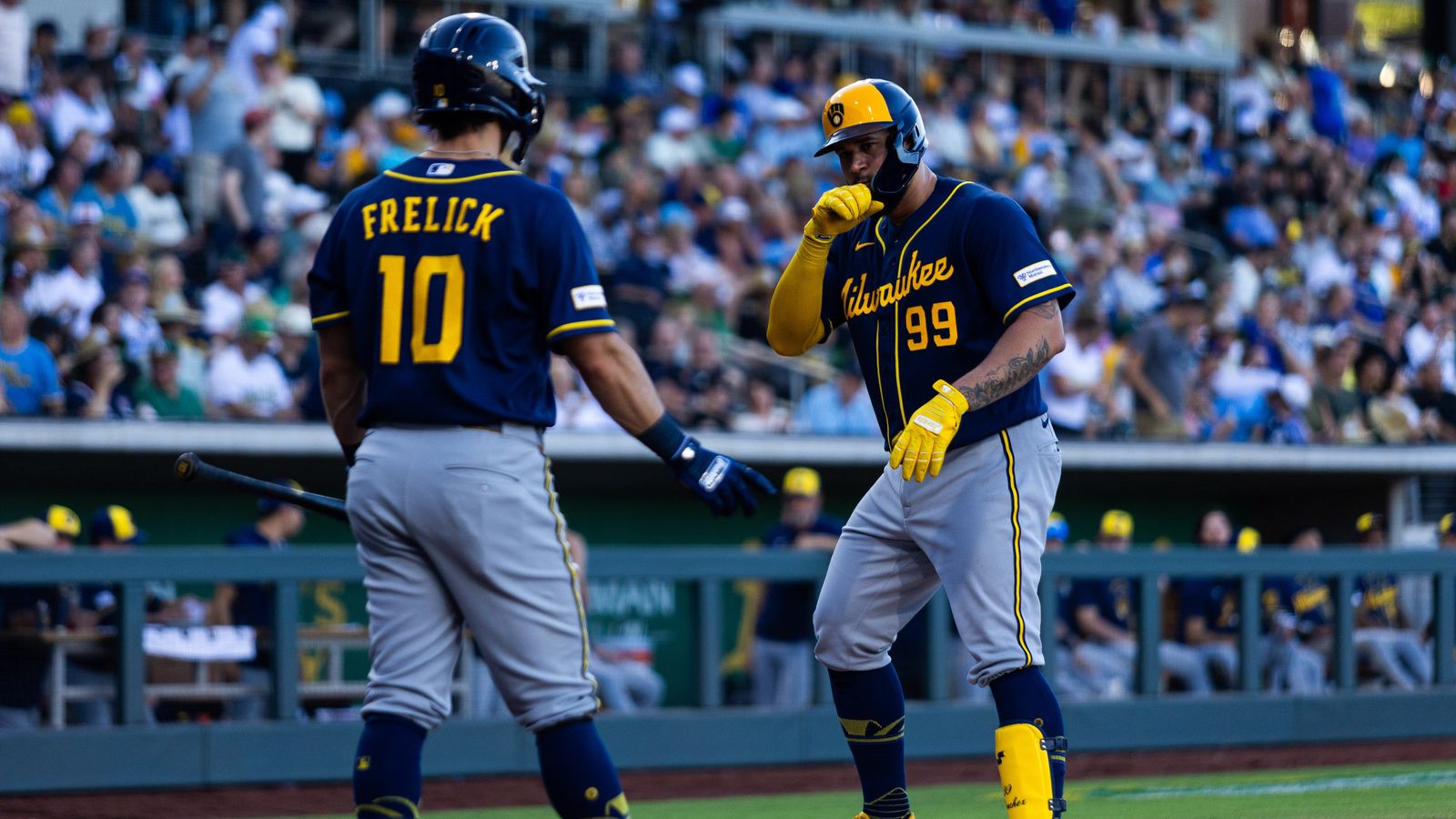 Gary Sanchez celebrates scoring for Brewers against Athletics