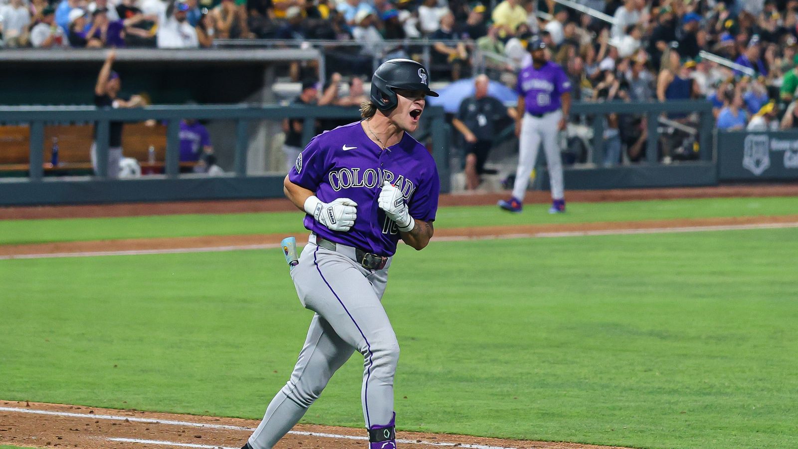 Cole Carrigg reacts to his 3-run homer against the Athletics