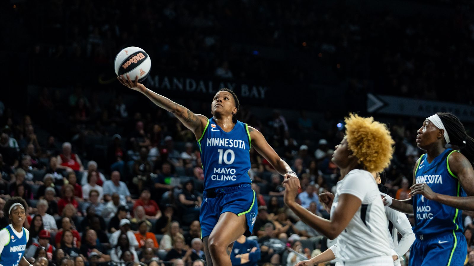 Courtney Williams attempts a lay-up against the Aces