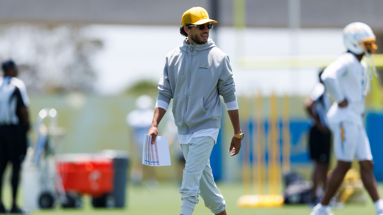 Mike McDaniels coaching on the field at Chargers minicamp