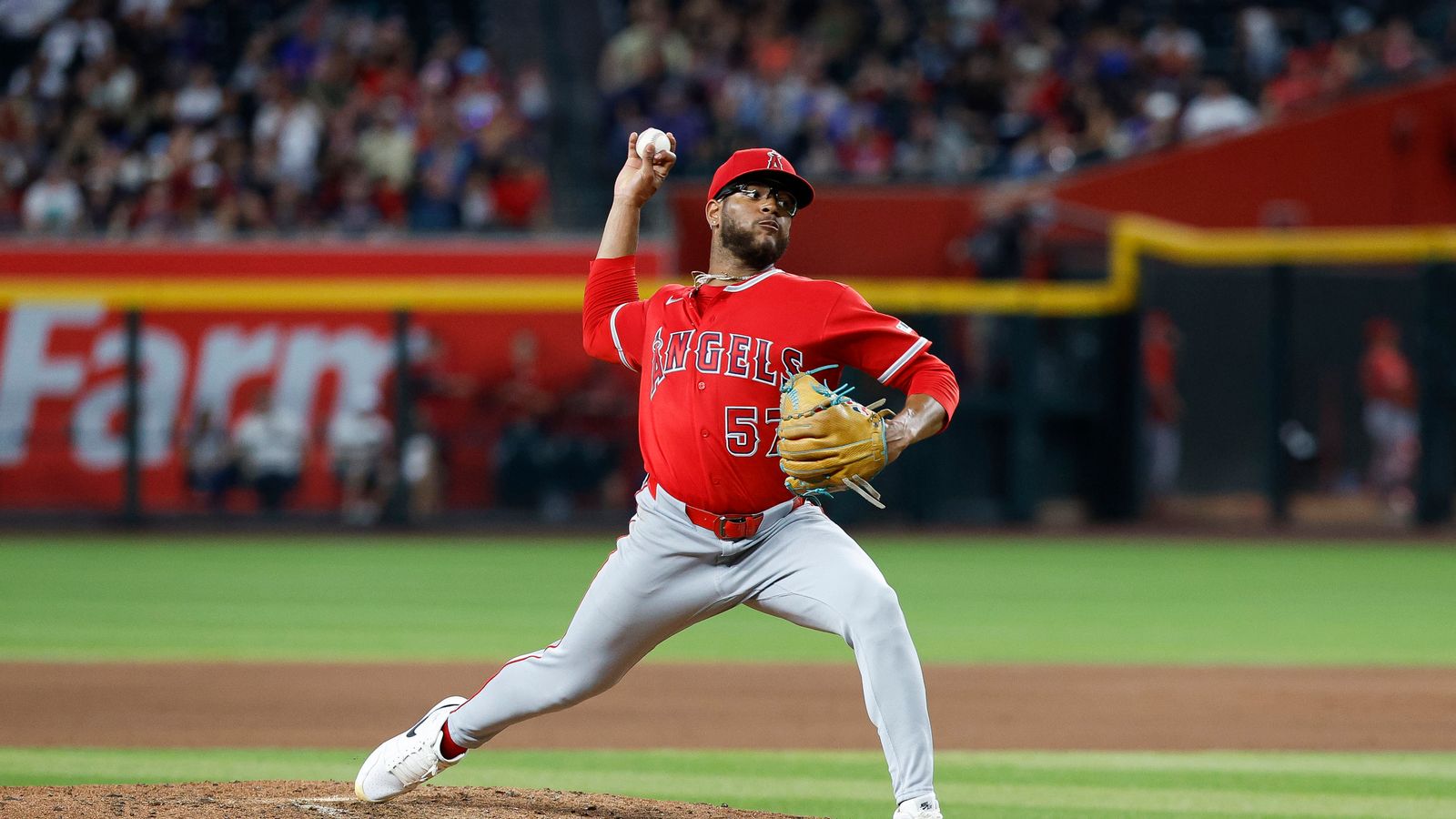 Walbert Urena pitches against the Diamondbacks at Chase Field