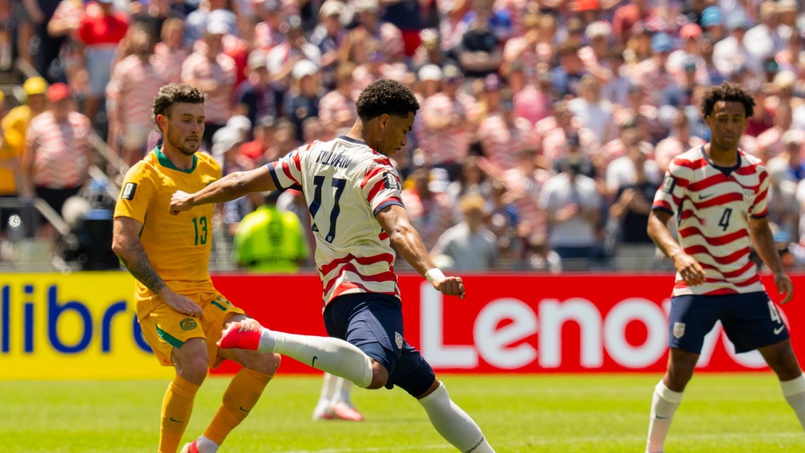 Malik Tillman clears the ball in the World Cup match against Australia.