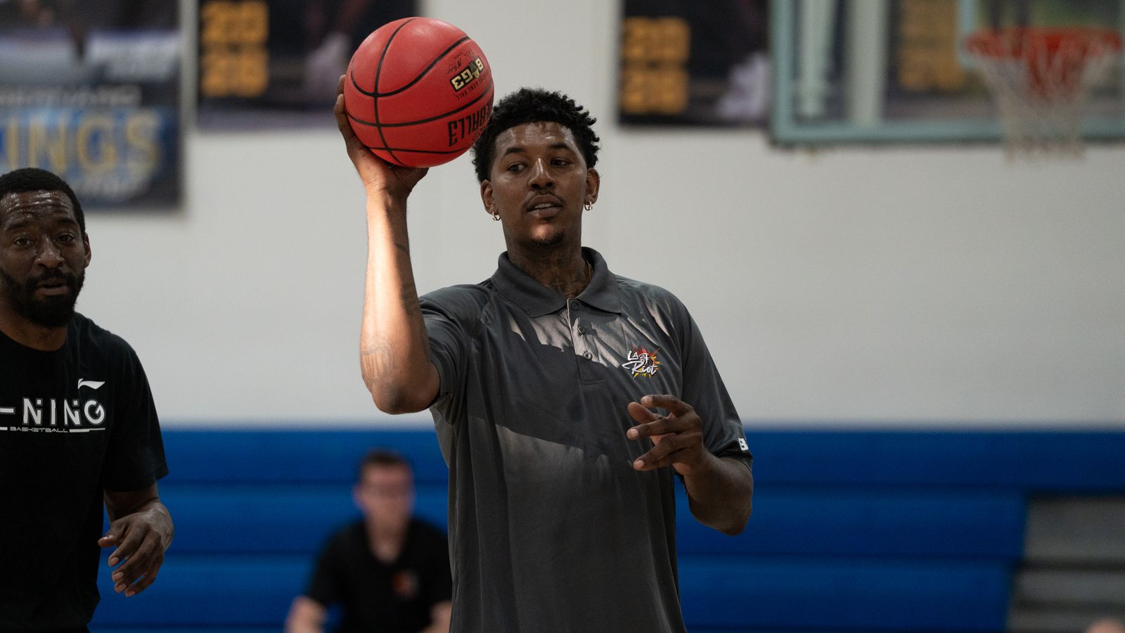 Coach Nick Young directs LA Riot's practice session