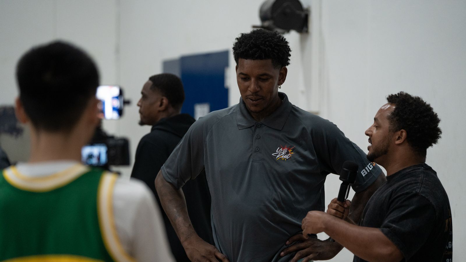 Coach Nick Young interviewed post-practice in LA