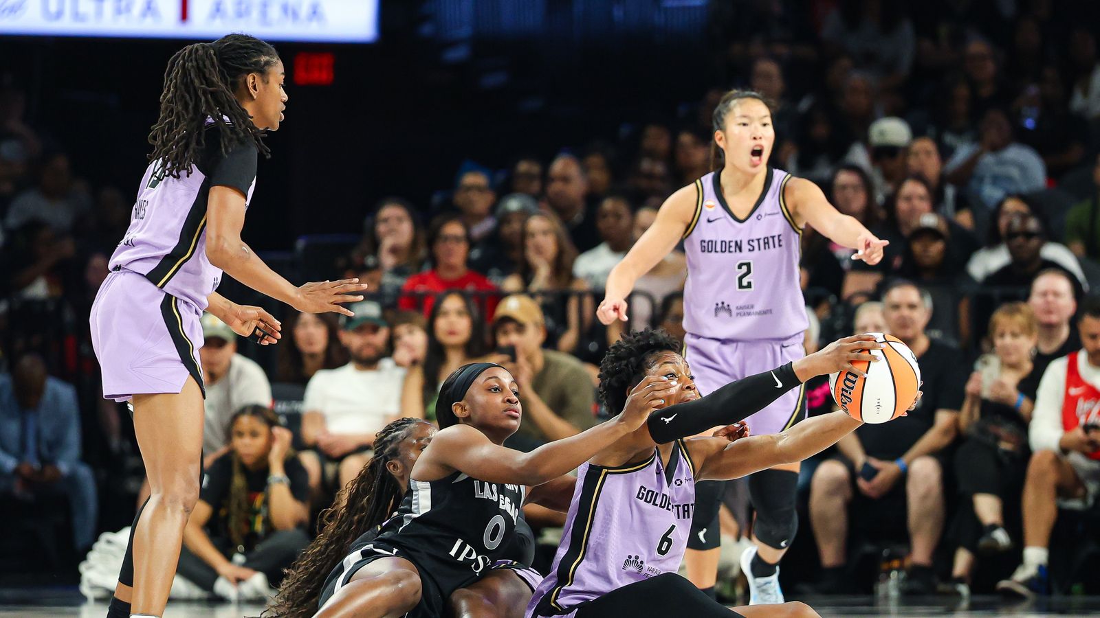 Kaila Charles recovers a loose ball during the game.