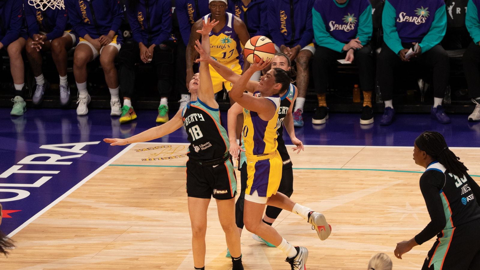 Kelsey Plum in action during a tight game against Liberty