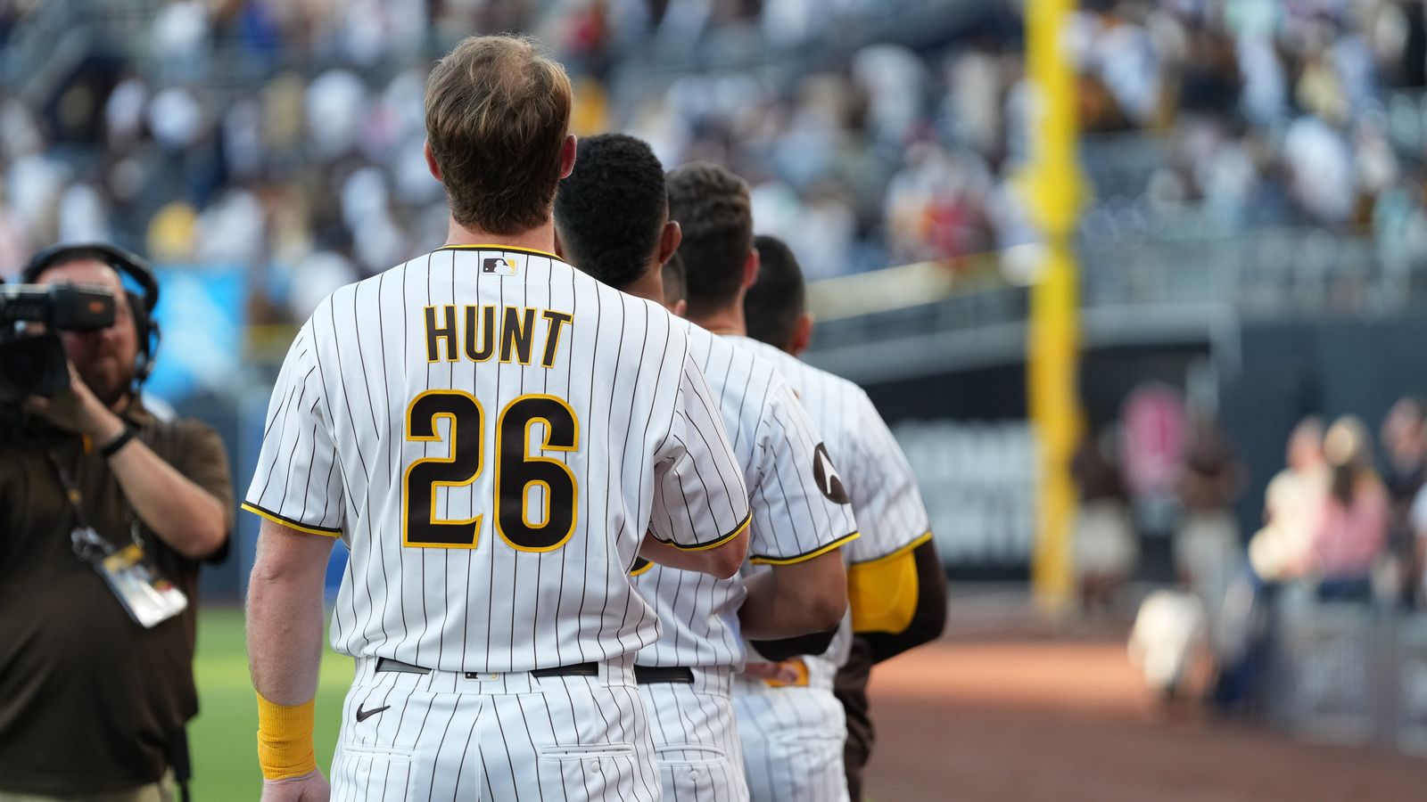 Blake Hunt and Padres team during the national anthem