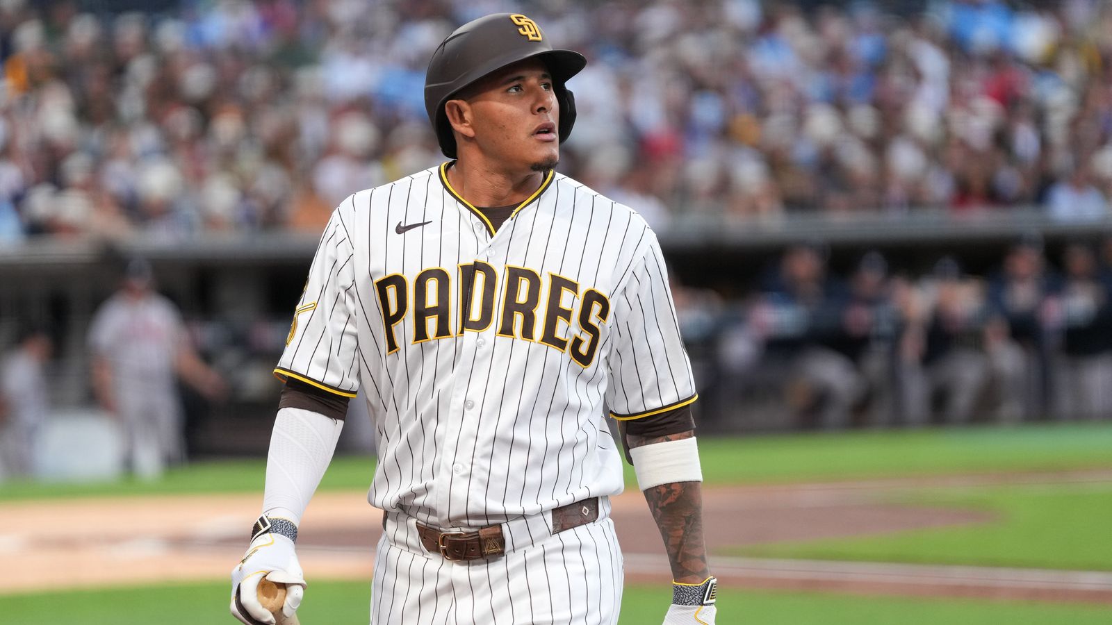 Manny Machado reacts to a strikeout against the Braves
