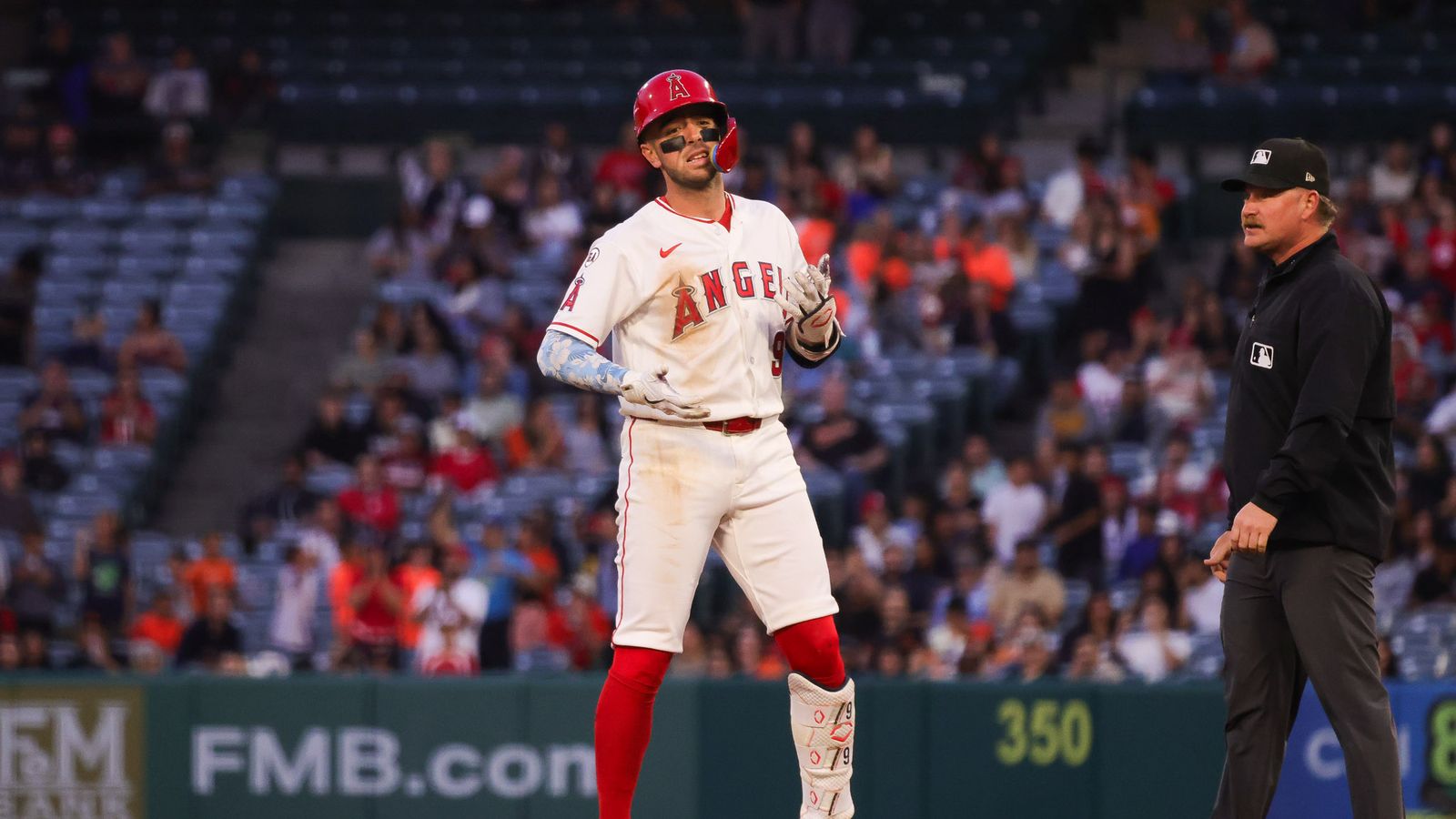 Zach Neto celebrates during the game against the Orioles