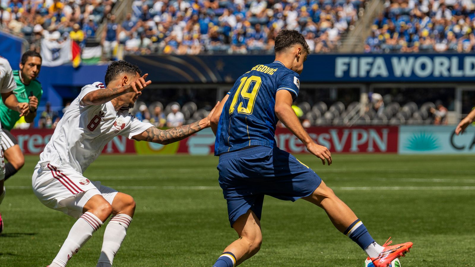 Kerim Alajbegovic outmaneuvers a defender in the FIFA World Cup 2026.