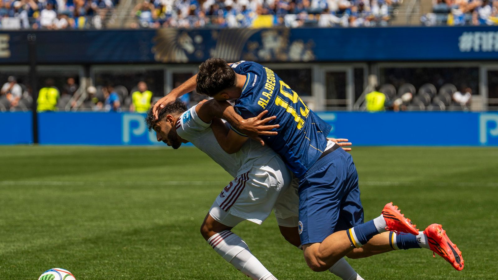 Kerim Alajbegovic tackles a defender at the FIFA World Cup 2026.