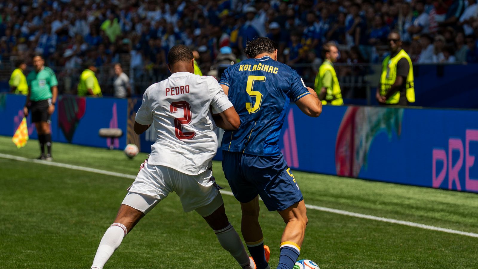 Pedro Miguel and Sead Kolasinac vie for the ball in FIFA World Cup 2026.