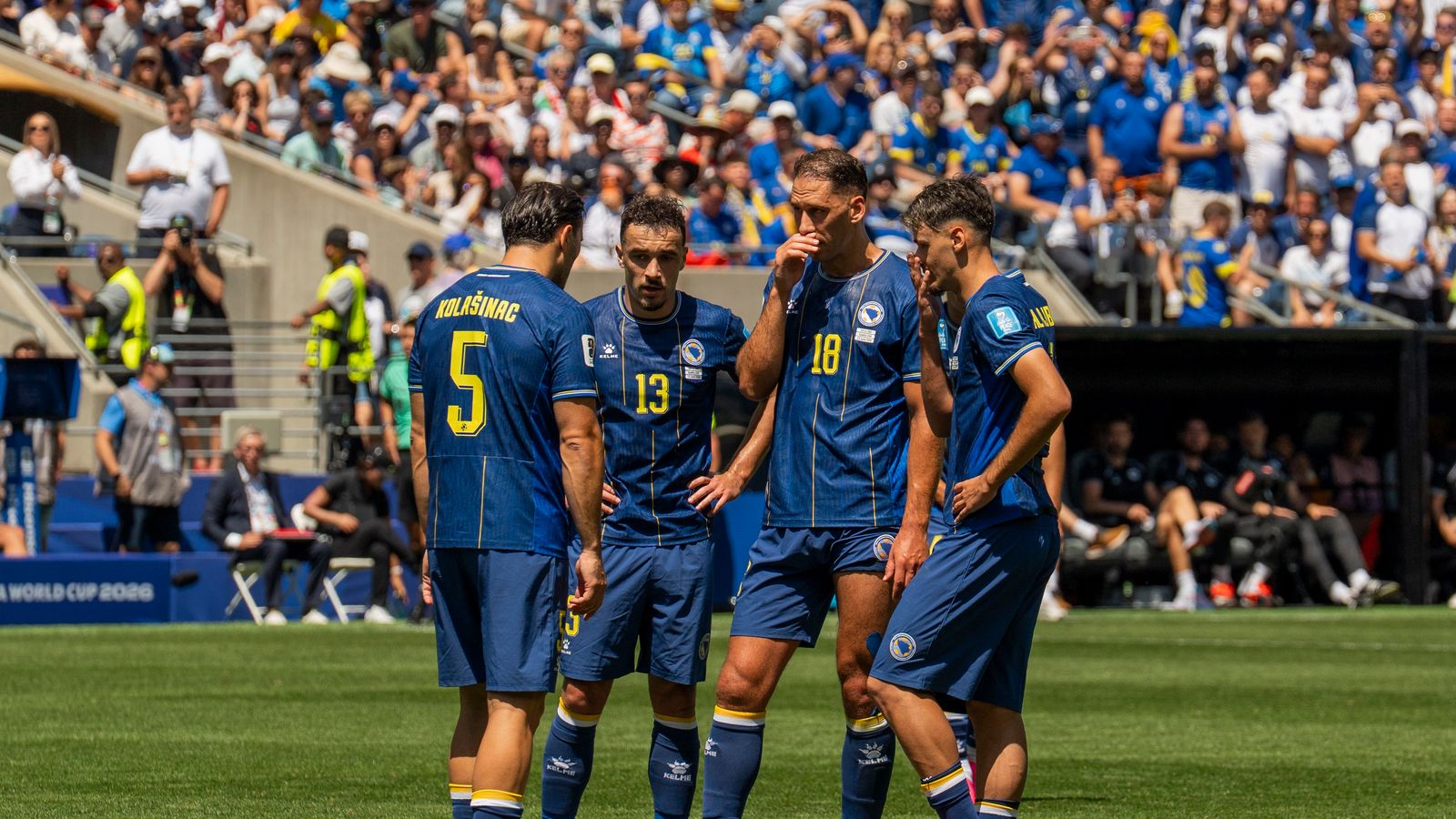 Bosnia-Herzegovina team huddle before a free kick at FIFA World Cup 2026.