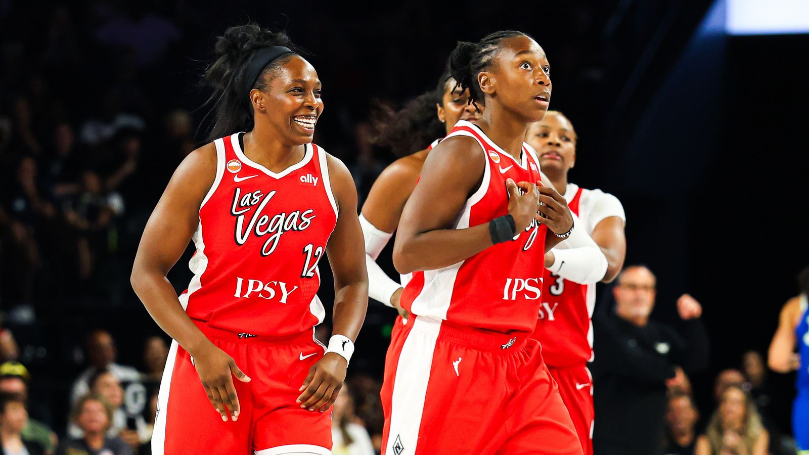 Chelsea Gray smiles after a three-pointer by Jewell Loyd.