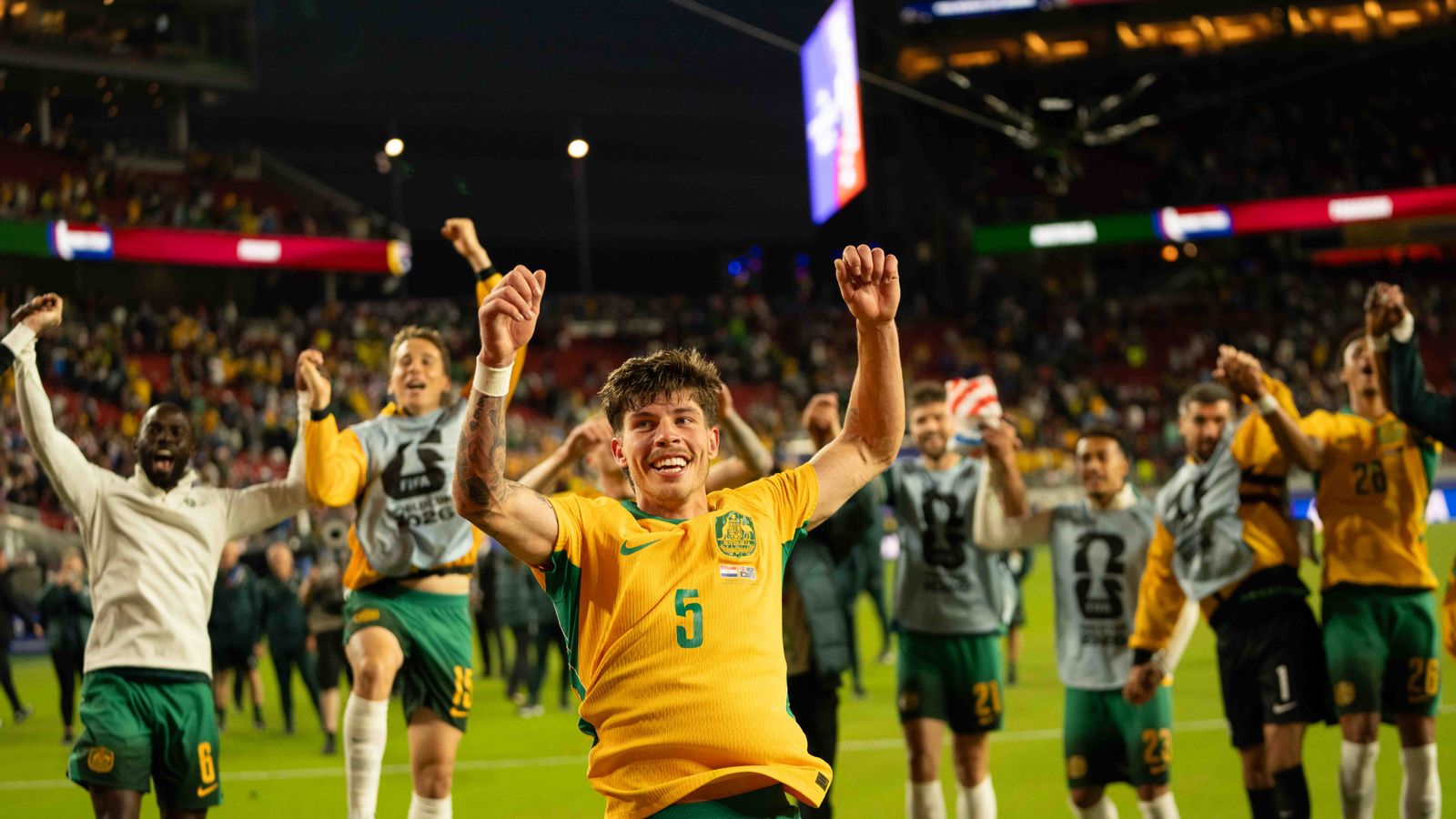 Jordan Bos leads a cheer with fans at the FIFA World Cup 2026