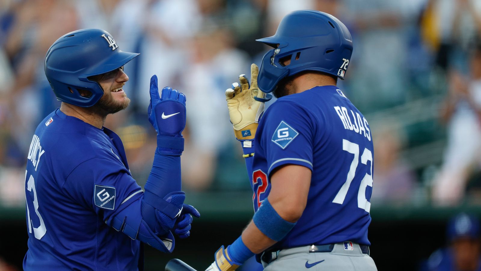 Max Muncy #13 of the Dodgers celebrates his home run