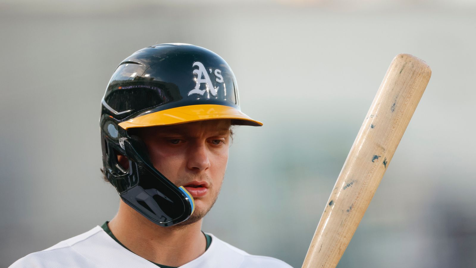 Nick Kurtz #16 holds his bat, ready to face the Dodgers
