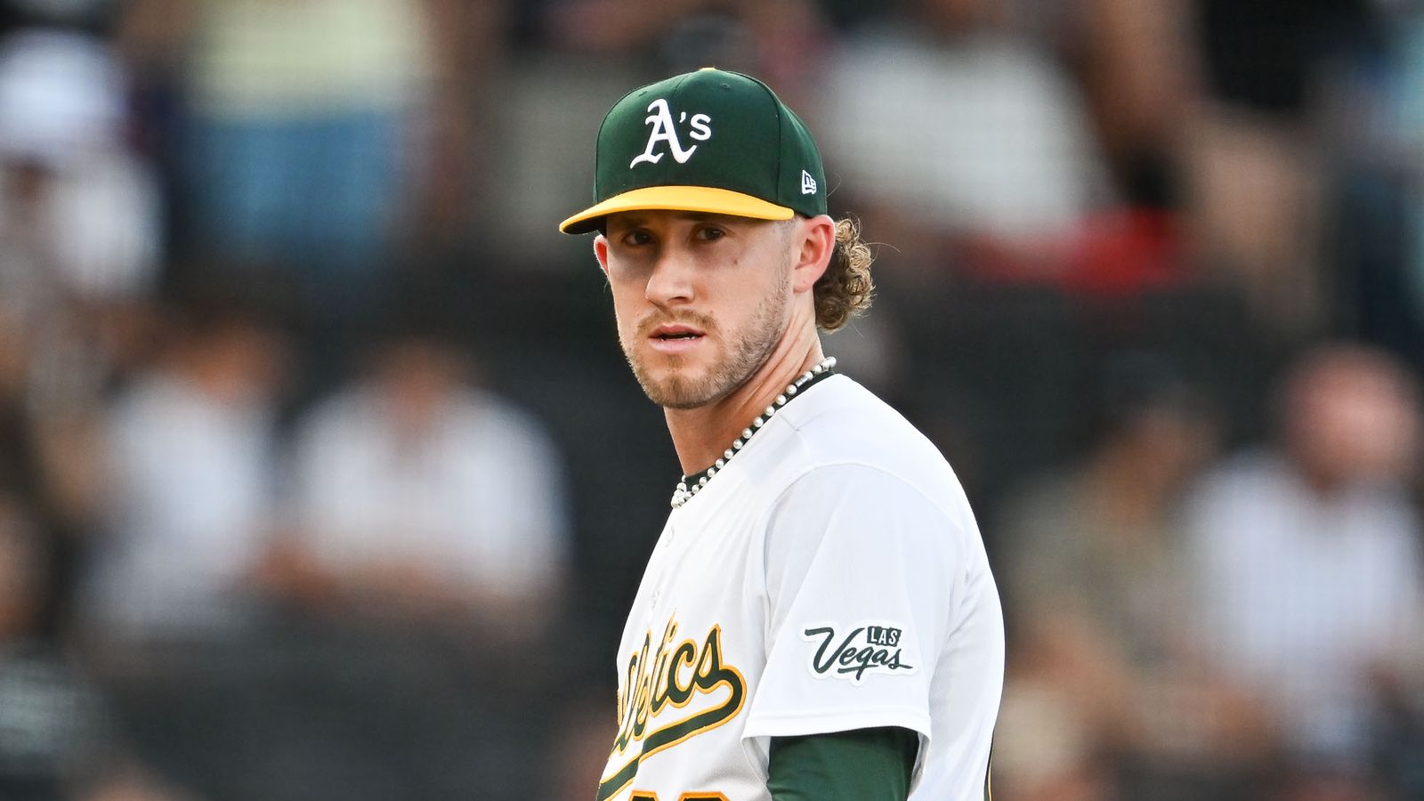Joey Estes eyes the runner at first in a tense moment.