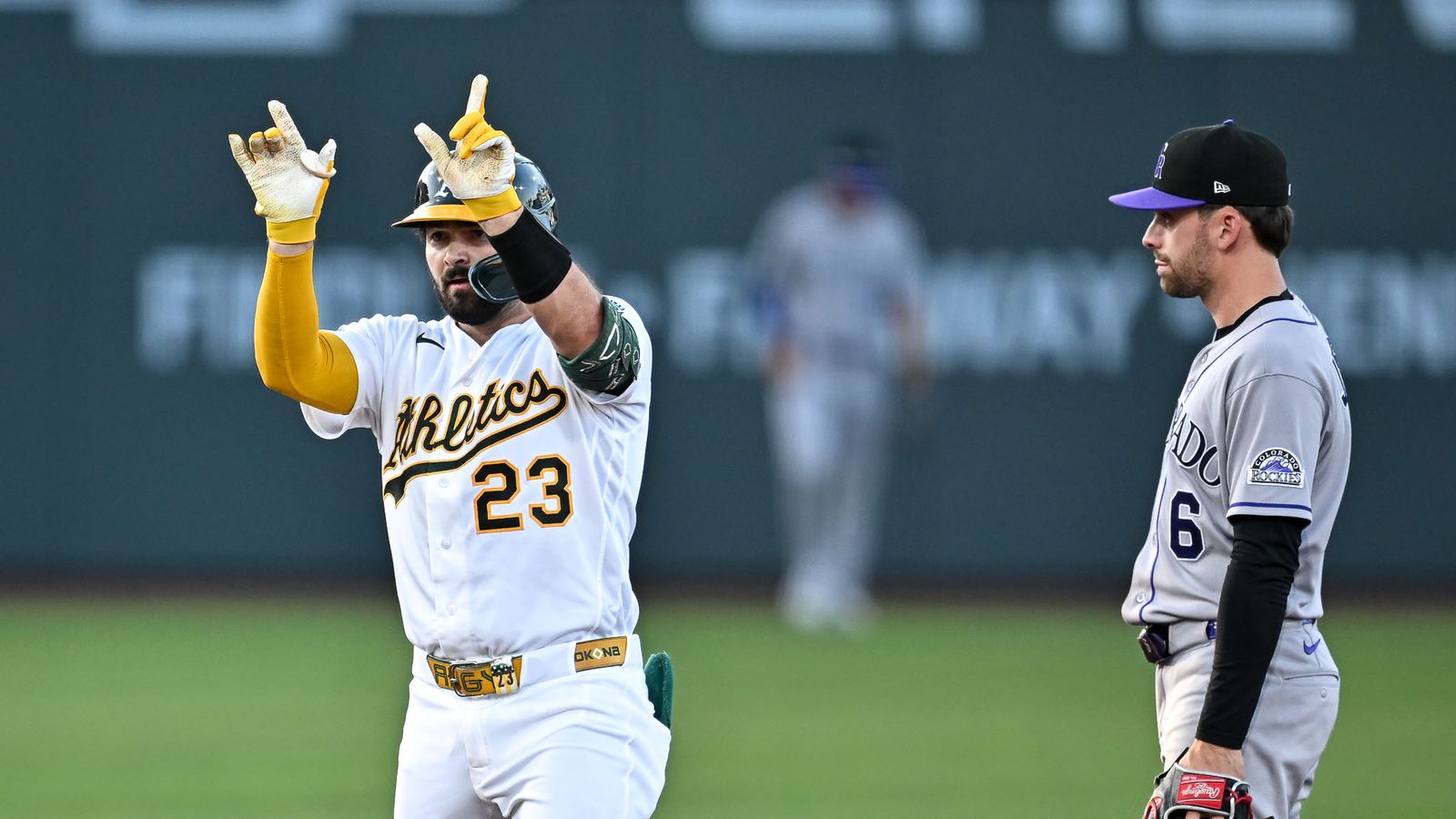 Shea Langeliers hits a double against the Rockies.