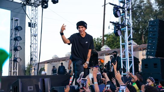 Chino Pacas performs during