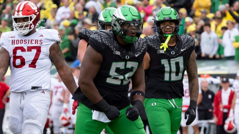 17) DT A'Mauri Washington, Oregon