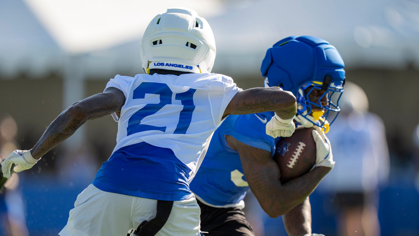 Cam Lampkin tries to punch the ball