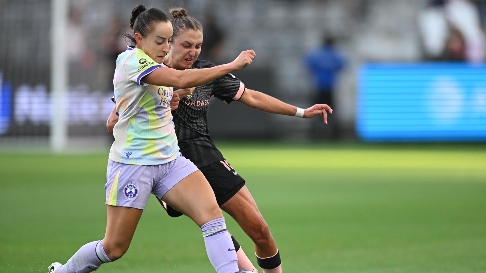 Carina Lageyre in a midfield tussle at BMO Stadium