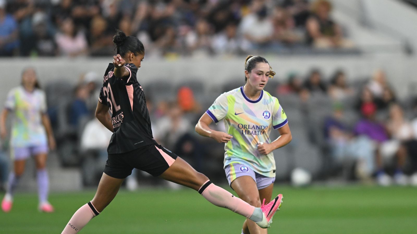 Sveindis Jonsdottir blocks a pass, showing defensive skills