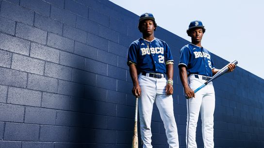 James and Miles Clark pose at their high school in Bellflower, May 2026
