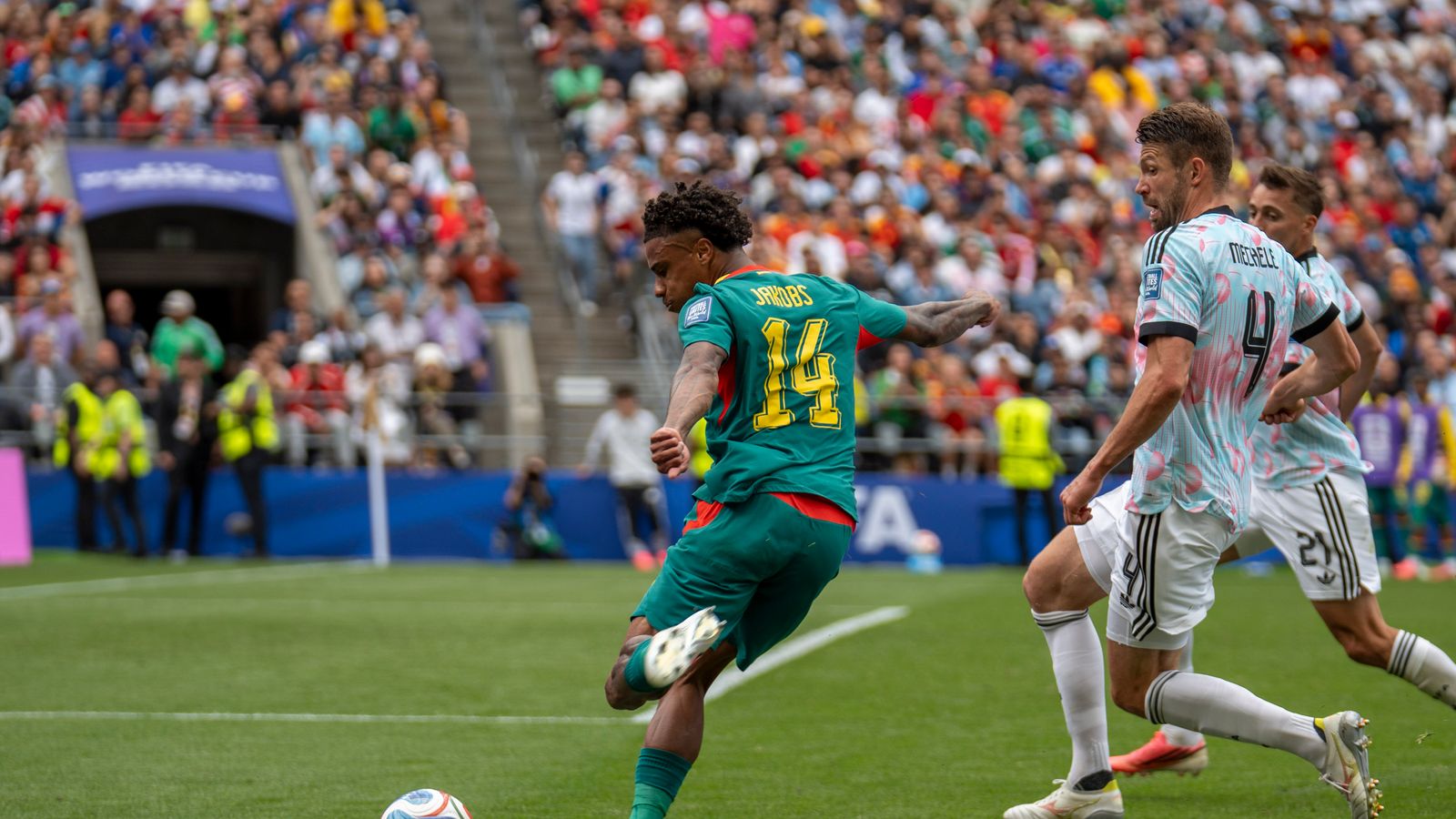 Ismail Jakobs delivers a cross during the match