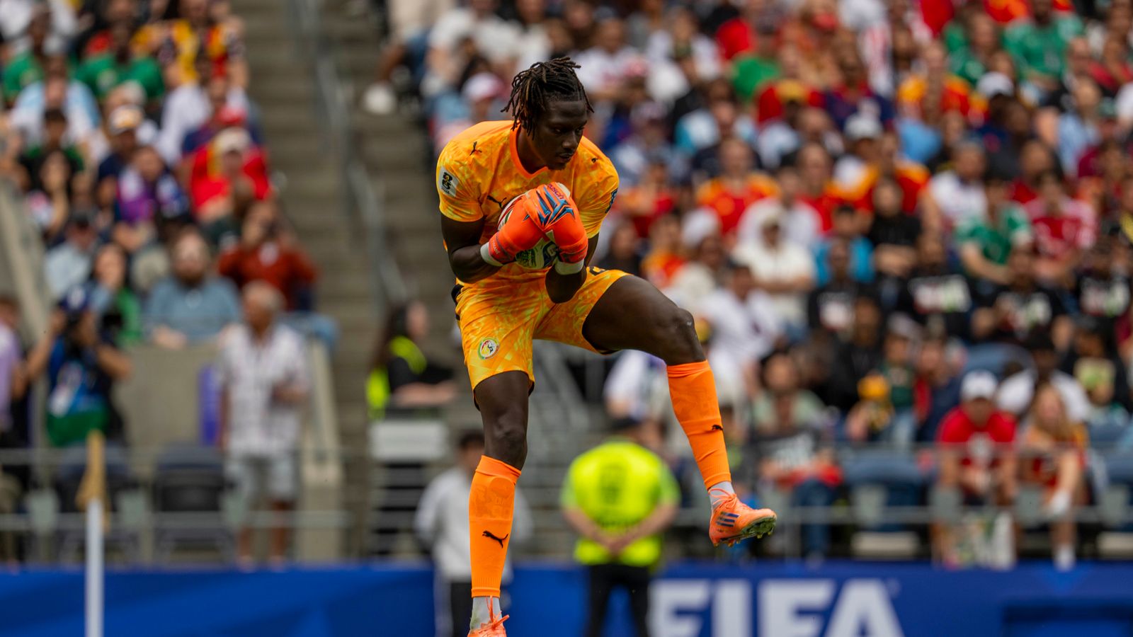 Goalie Edouard Mendy makes a save against Belgium
