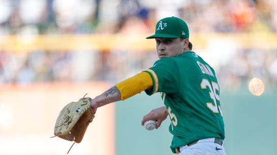 J.T. Ginn #35 pitches for Athletics against Dodgers at Sutter Health Park