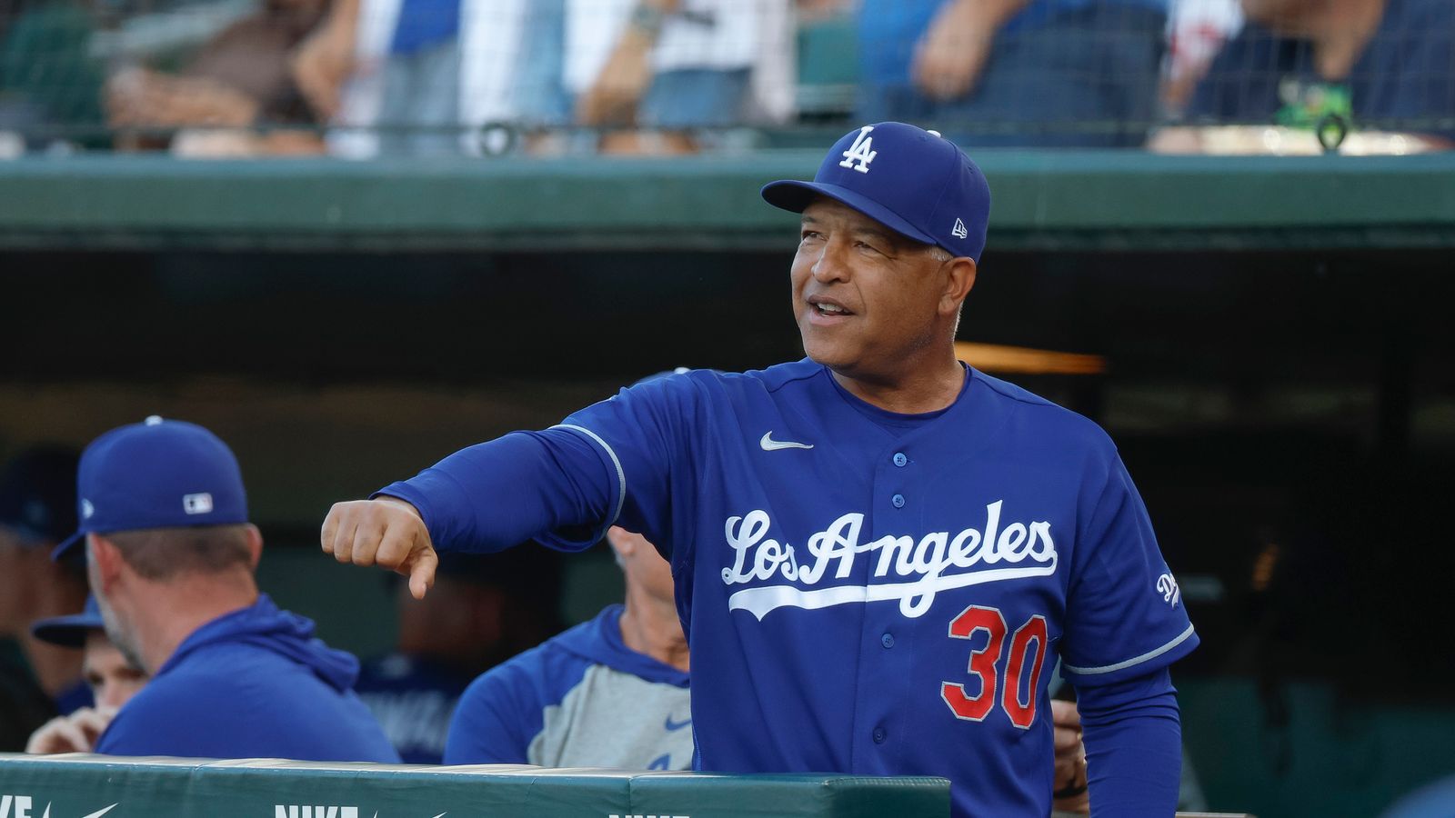 Dave Roberts #30 in Dodgers dugout at Sutter Health Park