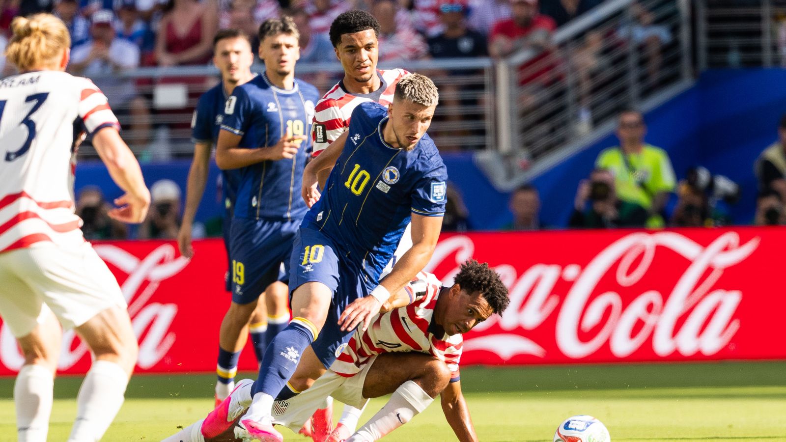 Ermedin Demirovic aiming for a goal in the FIFA World Cup 2026