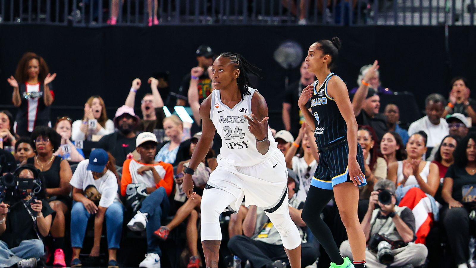 Jewell Loyd scores a three-pointer against the Sky.